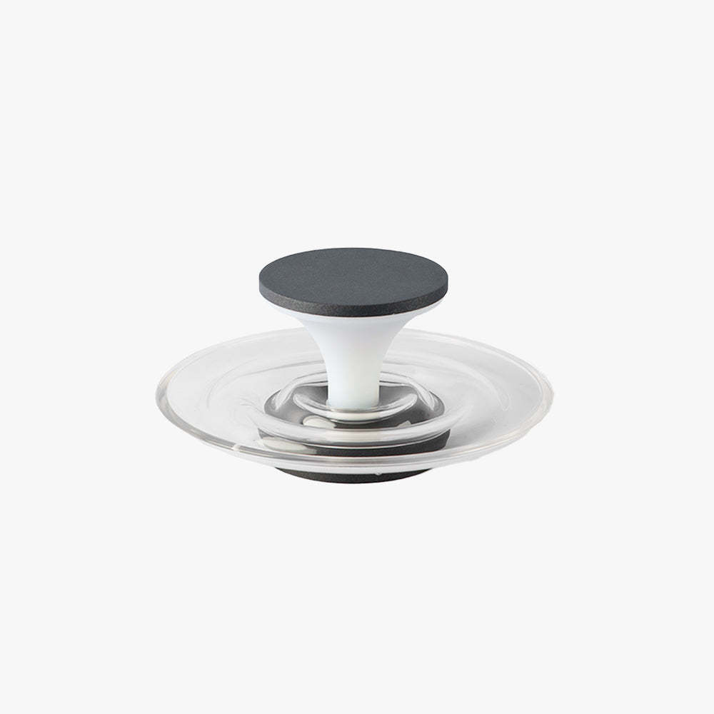 Modern round outdoor ground lamp with transparent design for pool or garden areas