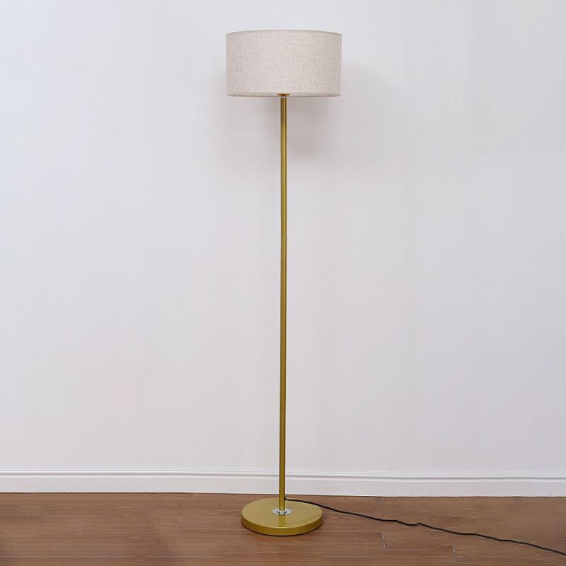 Gold Eryn Cylinder Floor Lamp with fabric shade.