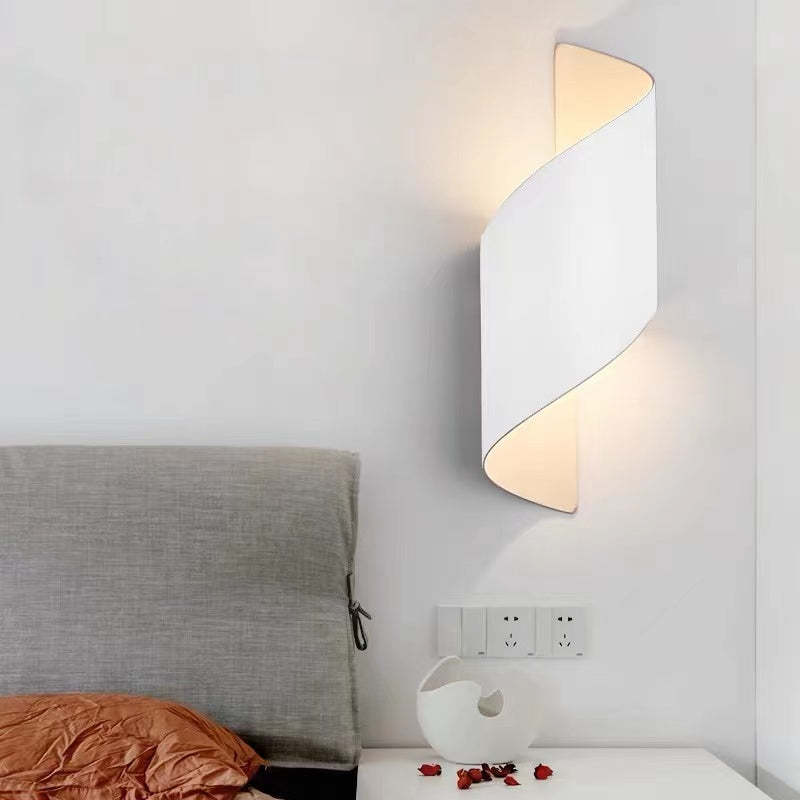 Modern white Orr wall lamp in bedroom. Las Sola.