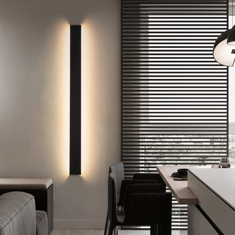 Edge Minimalist Wall Lamp illuminates modern interior
