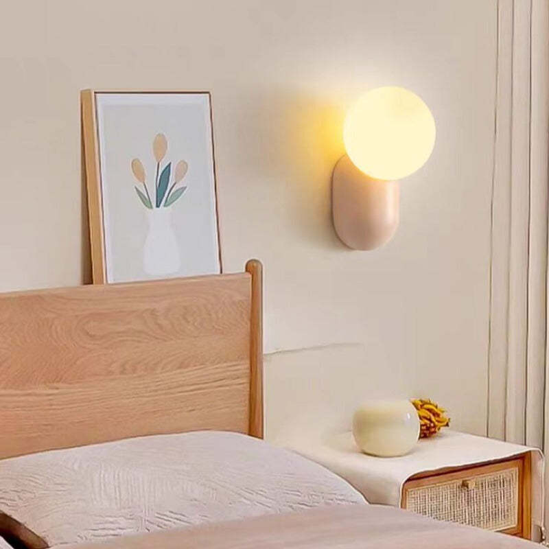 Modern bedroom with Hailie LED wall lamp illuminating the space