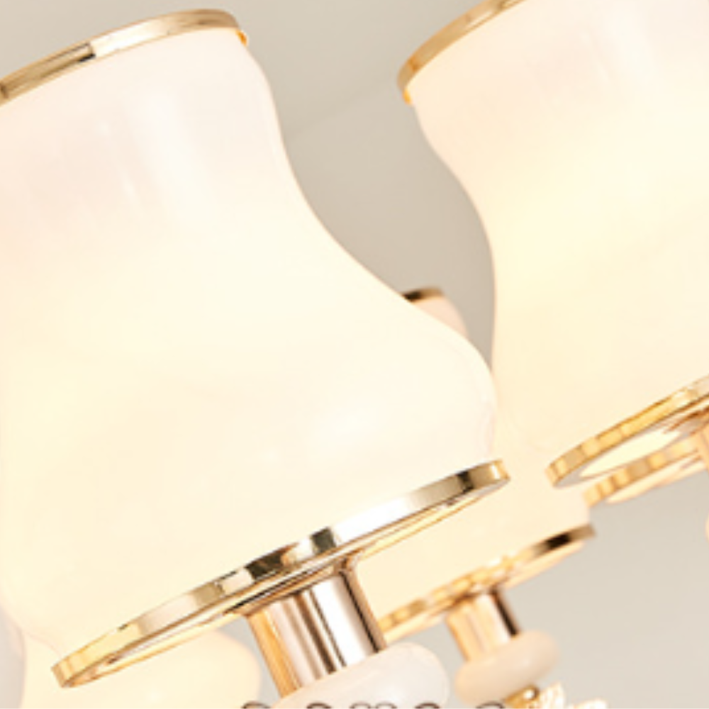 Alessio Pendant Light, glass shades with gold trim.