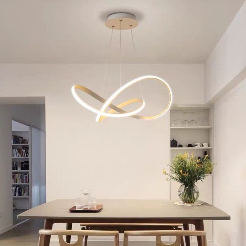 Louise LED pendant light above dining table