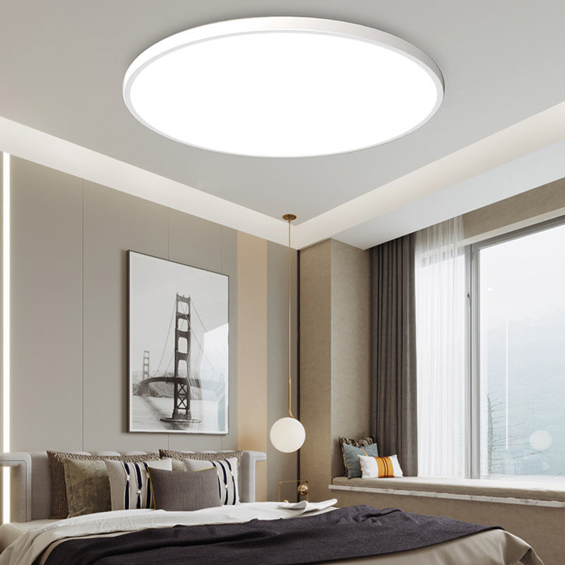 Quinn Round LED Ceiling Light in bedroom, modern interior design