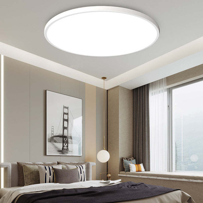 Quinn Round LED Ceiling Light in bedroom, modern interior design