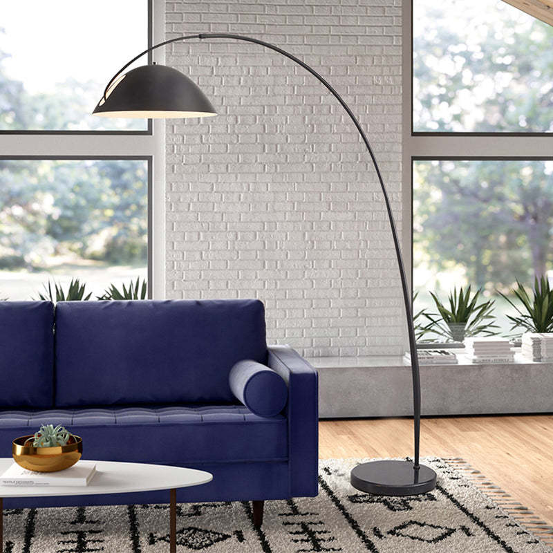 Avi floor lamp over blue sofa, Las Sola modern lighting.