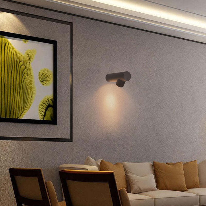 Orr Modern Wall Lamp illuminating living room wall