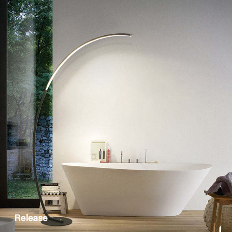 Modern arc LED floor lamp in bathroom, Las Sola lighting