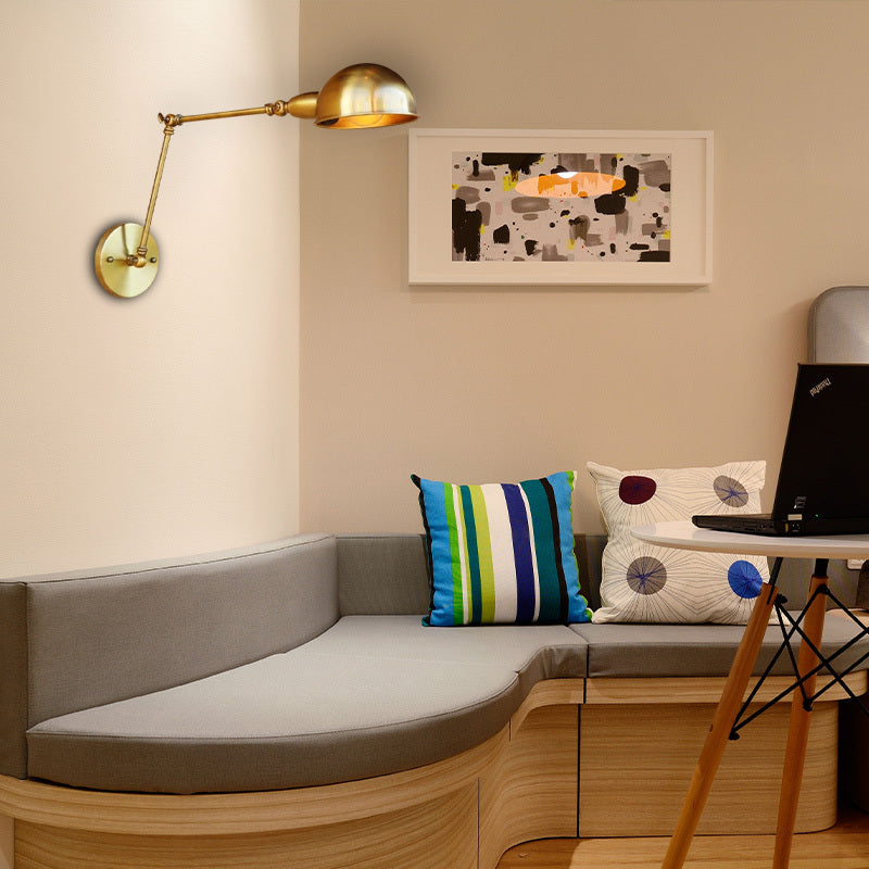 Bronze Swing Arm Wall Lamp over Living Room Couch