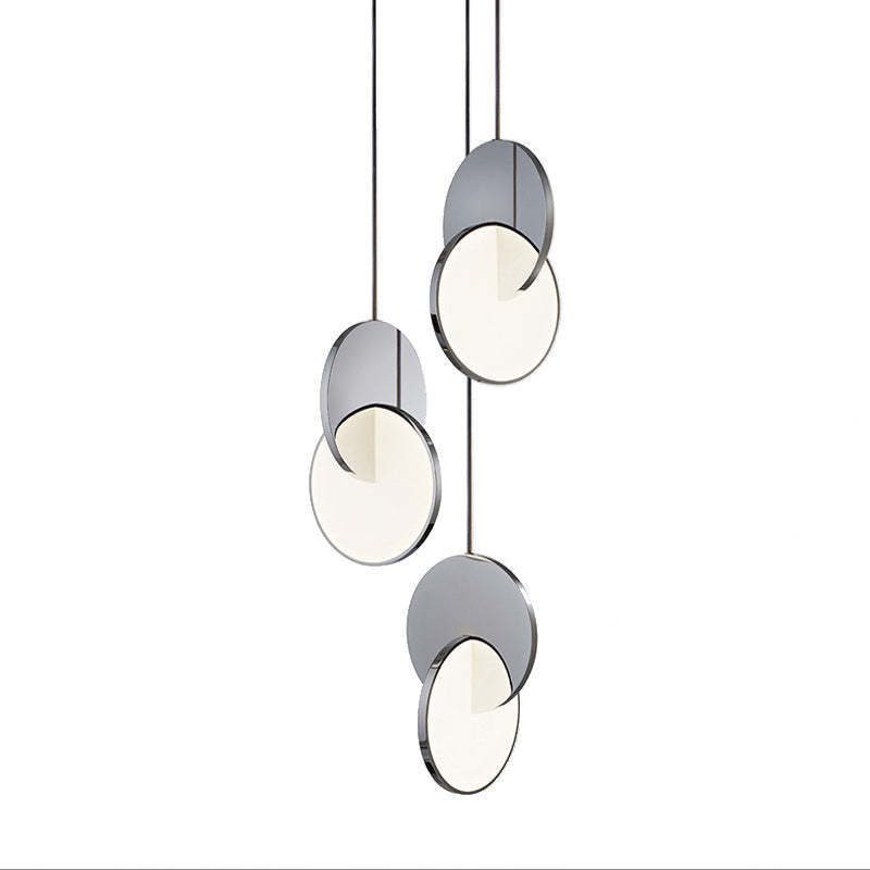 Welsh pendant light fixture with metal disc design
