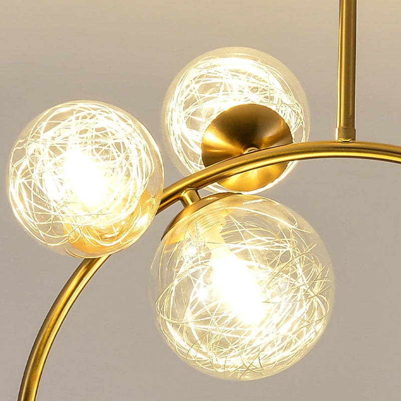 Valentina pendant light with decorative internal filaments