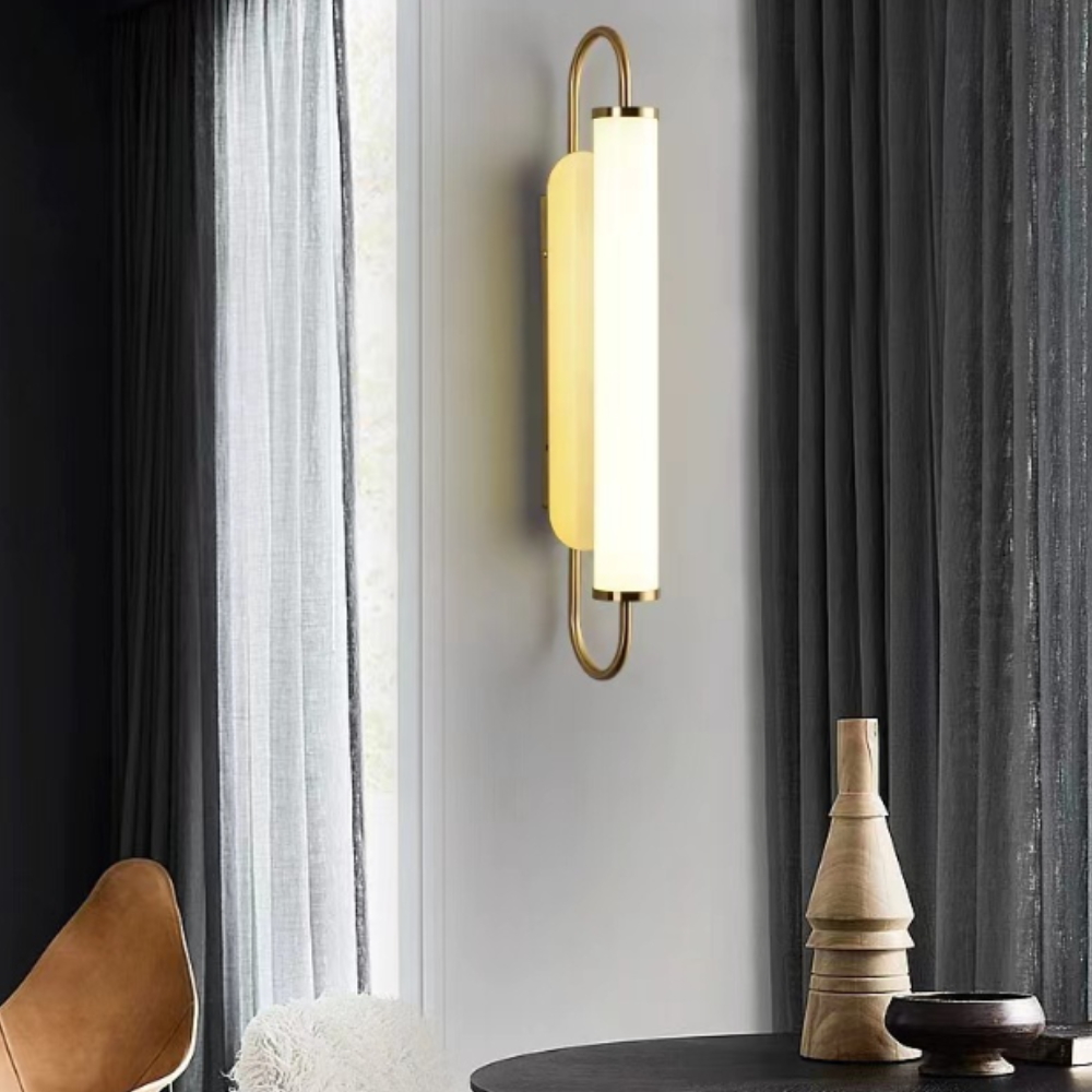 Quinn LED Wall Lamp illuminating a modern dining room
