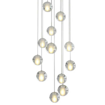 Modern globe pendant light for foyer lighting.