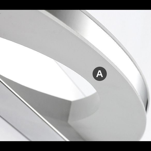 Leigh chrome wall lamp detail. Modern bathroom lighting fixture.