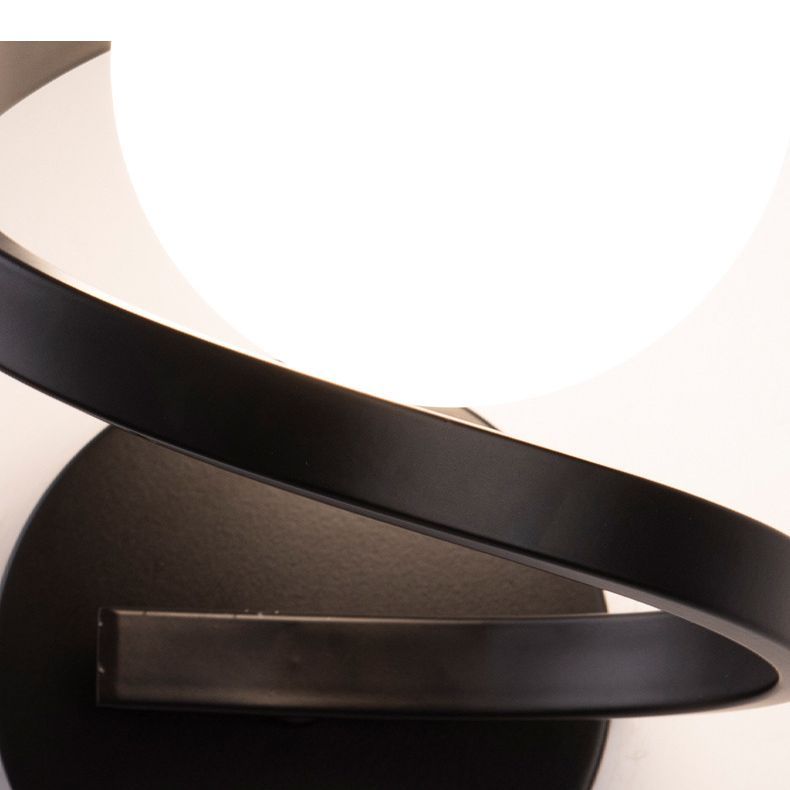 Black metal and glass wall lamp detail