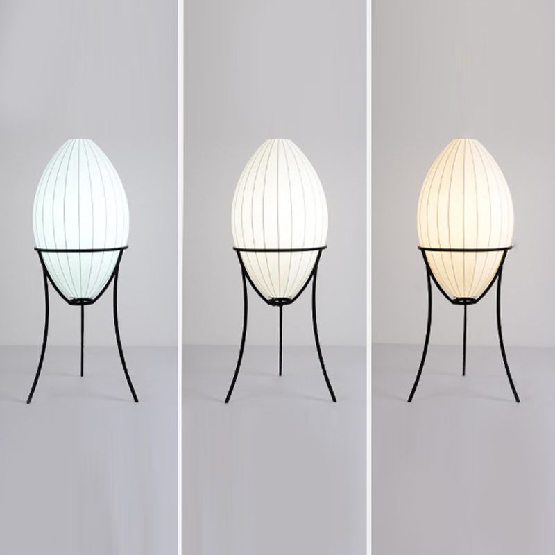 Renée floor lamp with different light tones, egg-shaped shade