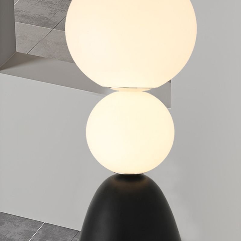 Valentina floor lamp: modern ball design, resin and glass
