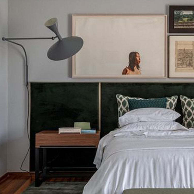 Gray Brady metal wall lamp in bedroom setting. Brady Modern Metal Rotatable Wall Lamp,Black/White/Gray