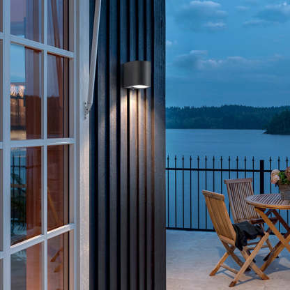 Orr outdoor wall lamp on patio, Las Sola lighting.