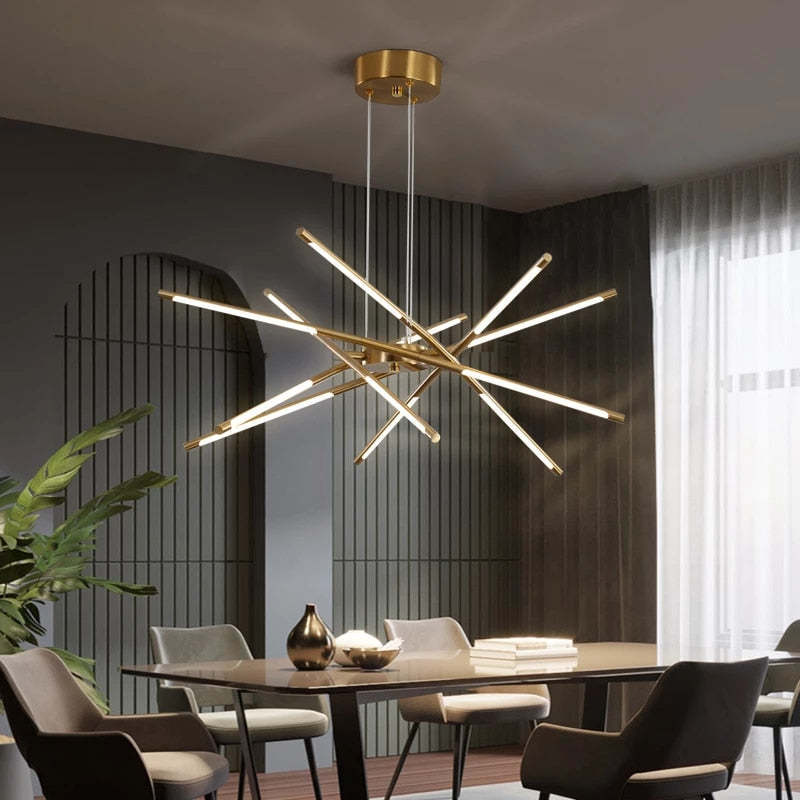 Modern gold pendant light over dining table