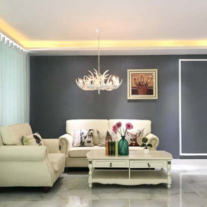 Living room with deer antler chandelier
