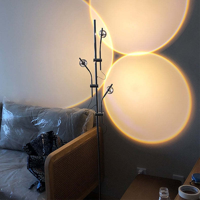 Salgado floor lamp projecting sunset light, modern interior