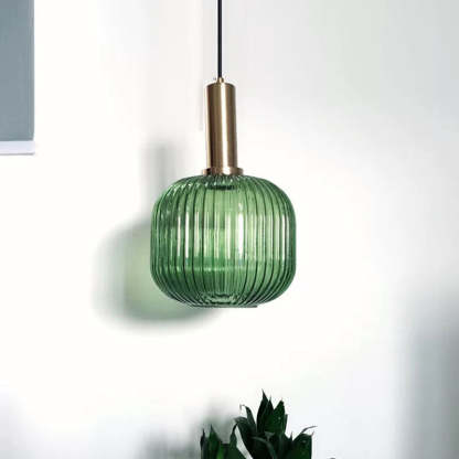 Green Hailie glass pendant light with brass fitting.