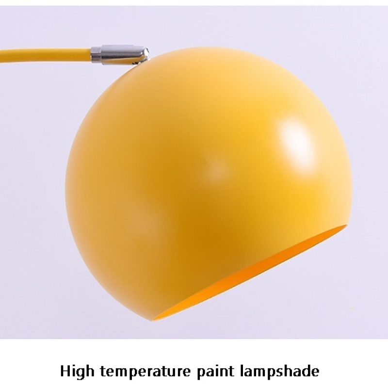Yellow Morandi arc lamp shade close-up. High temperature paint lampshade. Morandi Modern Fishing 1 Light Arc Floor Lamp Metal