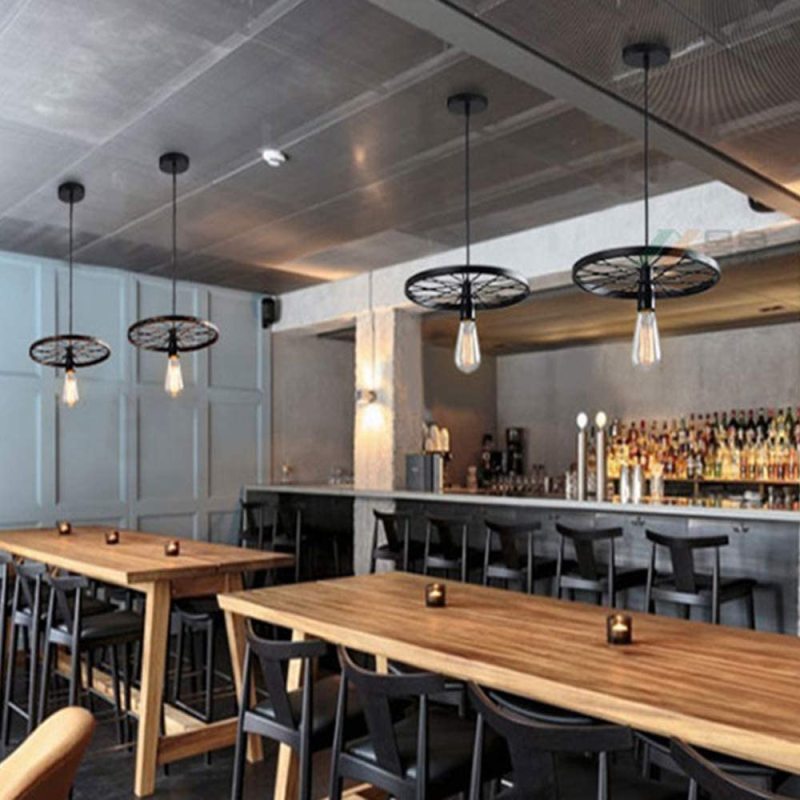 Alessio wagon wheel pendant lights in bar