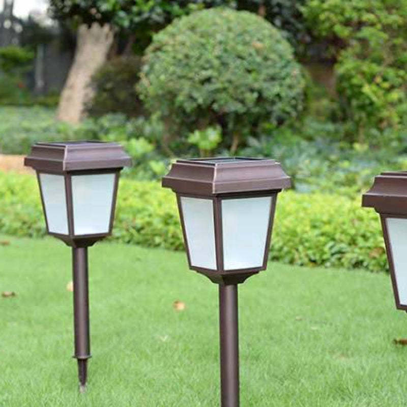 Coffee Pena solar bollard lights in garden