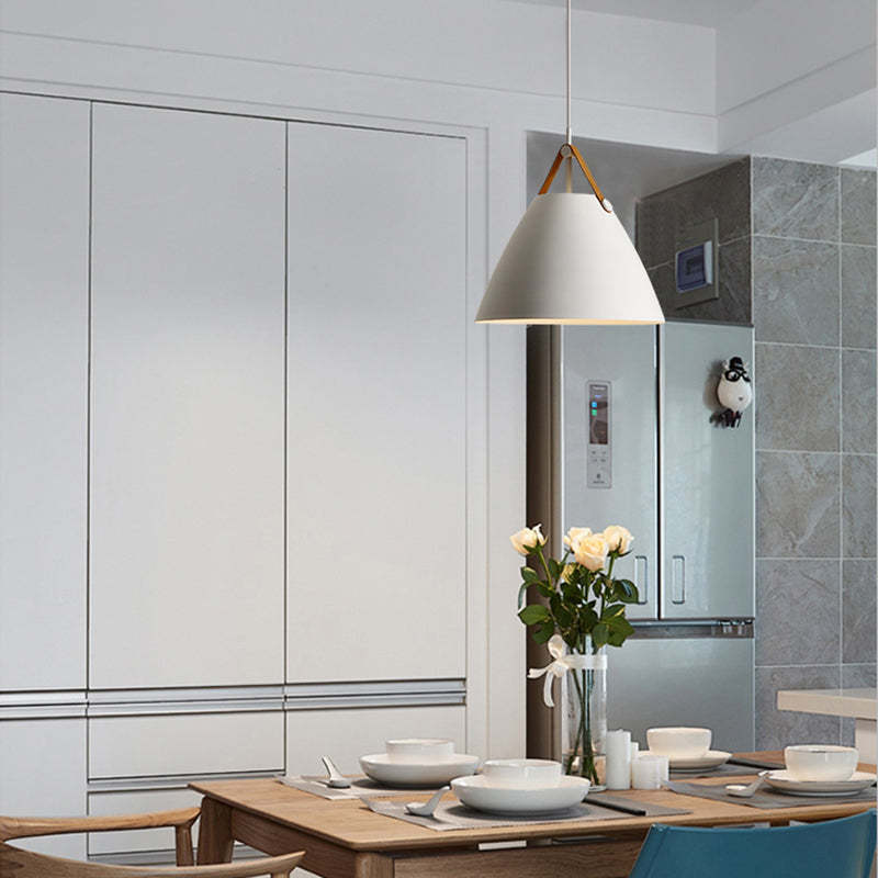 White Carins pendant light over dining table. Modern lighting.