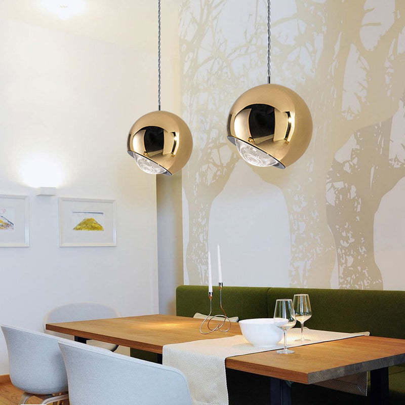 Gold Metal Ball Pendant Lights over Dining Table
