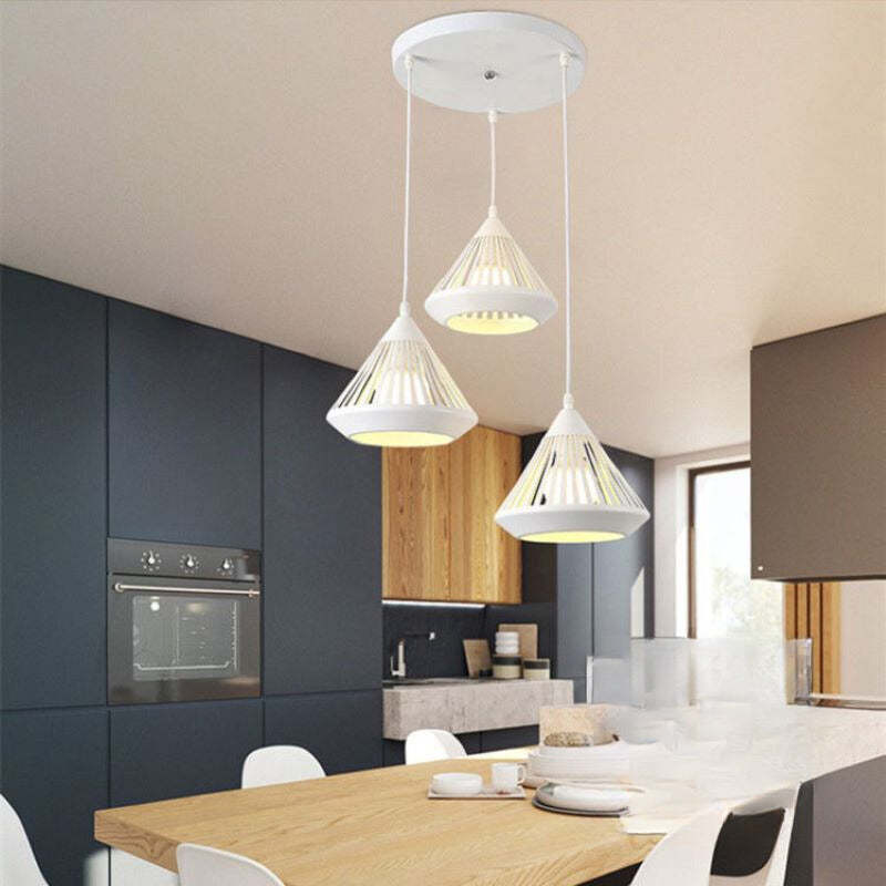 White Nazifa pendant lights over dining table