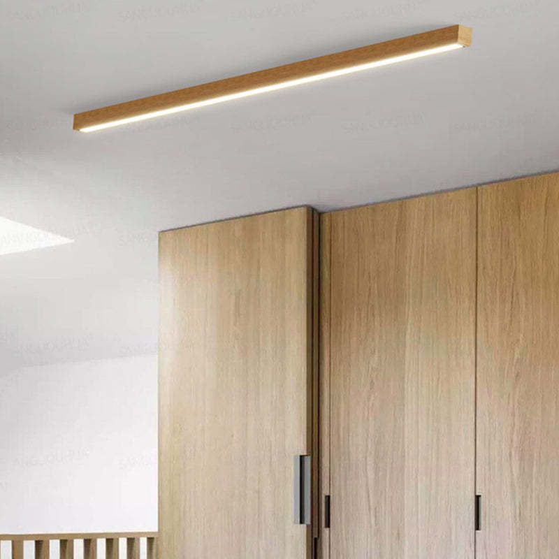 Modern wood ceiling light fixture in hallway.