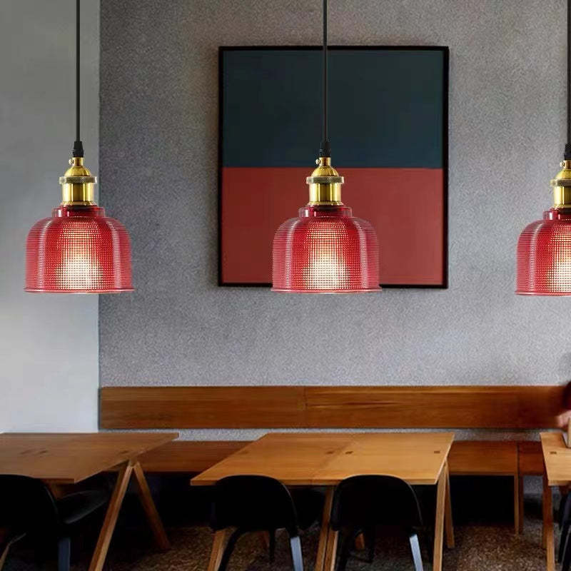 Red glass Art Deco pendant lighting in dining room