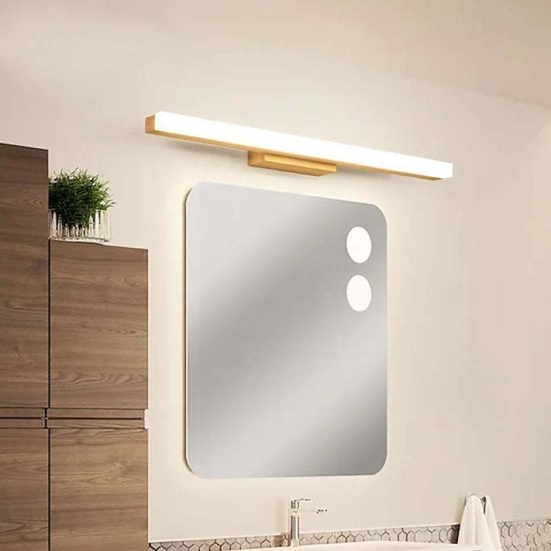Modern wood wall lamp above bathroom mirror.