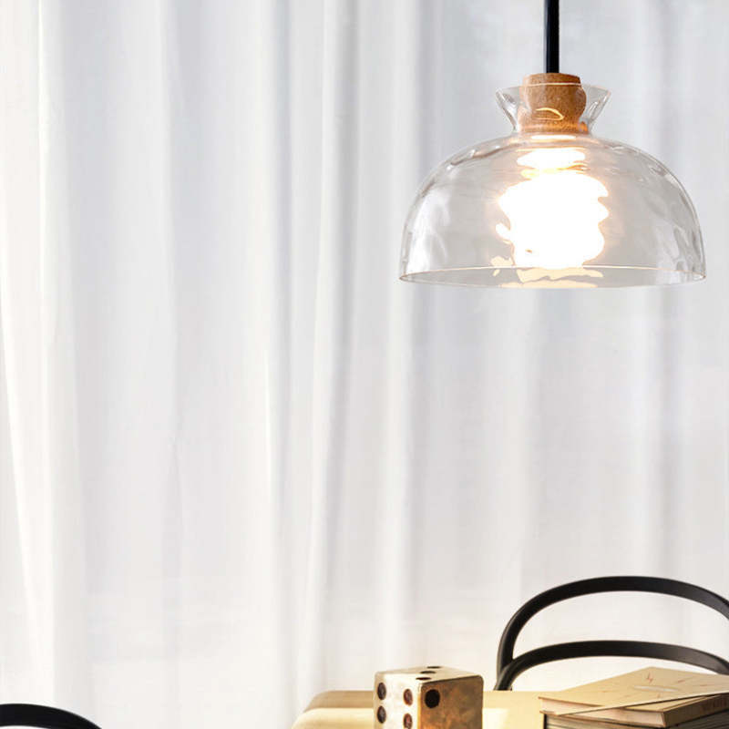 Levy glass pendant light in dining room.
