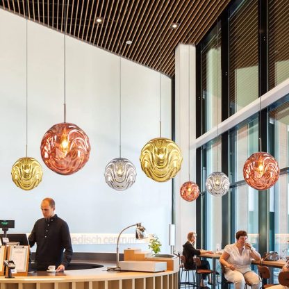 Modern sphere pendant lights in a dining room