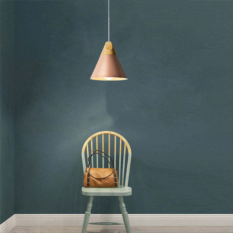 Pink Morandi pendant light over chair with bag, Lassola lighting