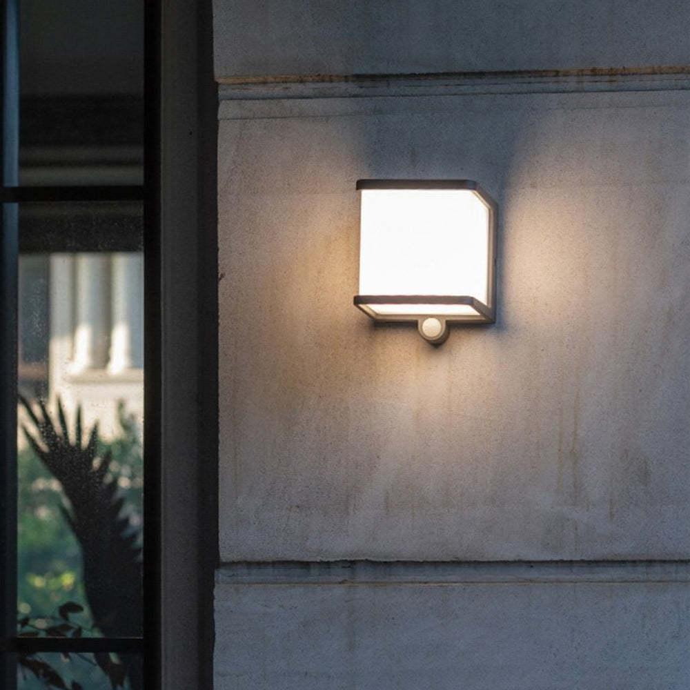 Orr solar outdoor wall lamp with sensor and acrylic shade