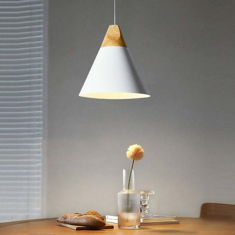 White Morandi pendant light over table, Lassola lighting