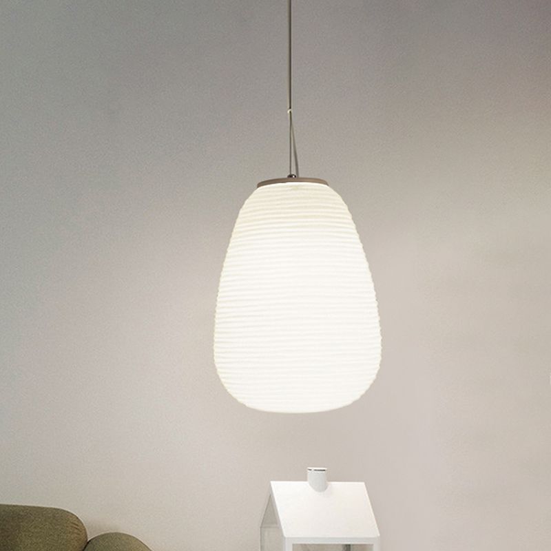White pebble-shaped Renée pendant light, Lassola design
