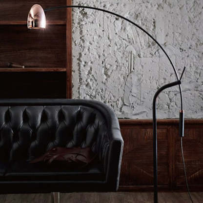 Artistic Minimalist Arc Floor Lamp near leather sofa