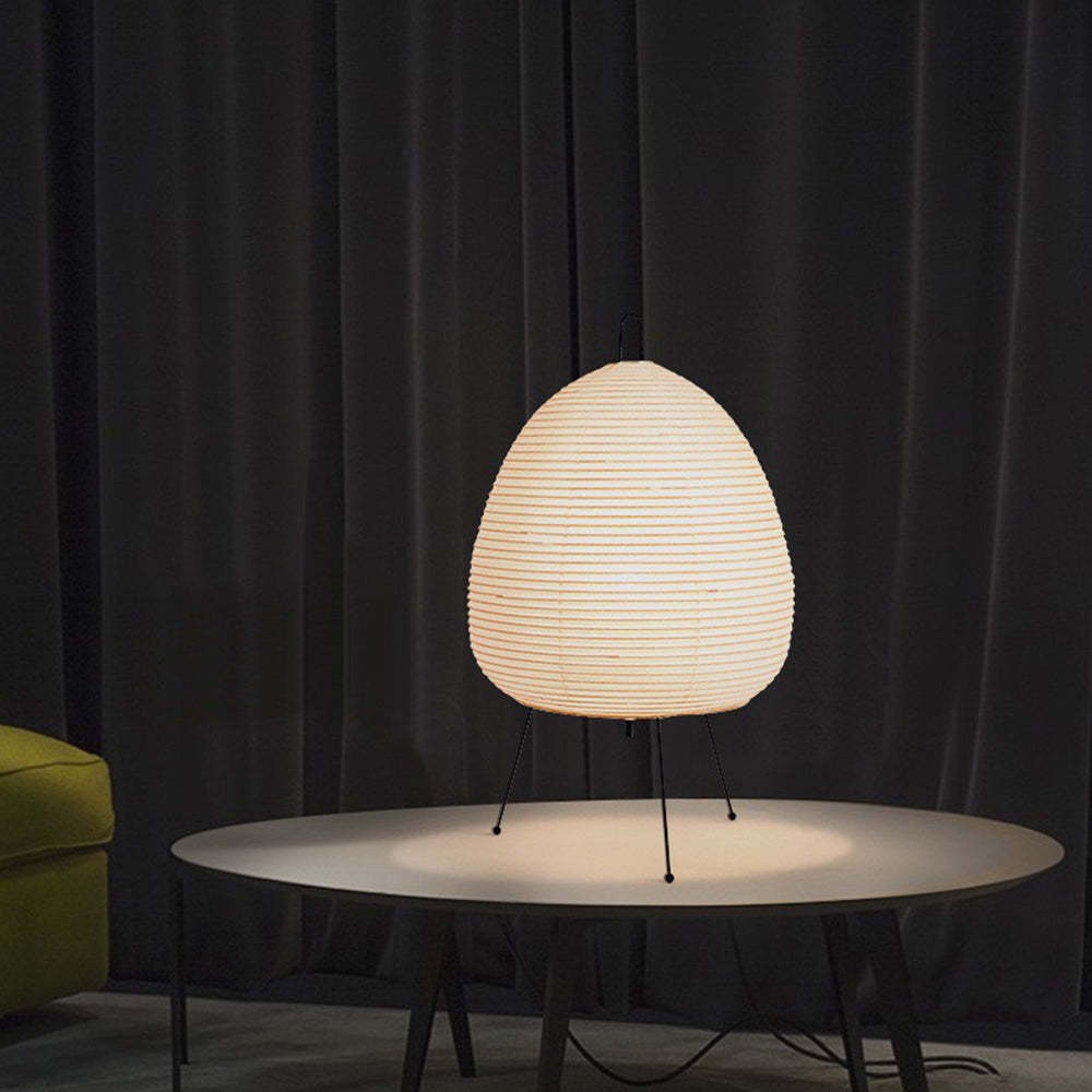Renée floor lamp on a round table, soft lighting