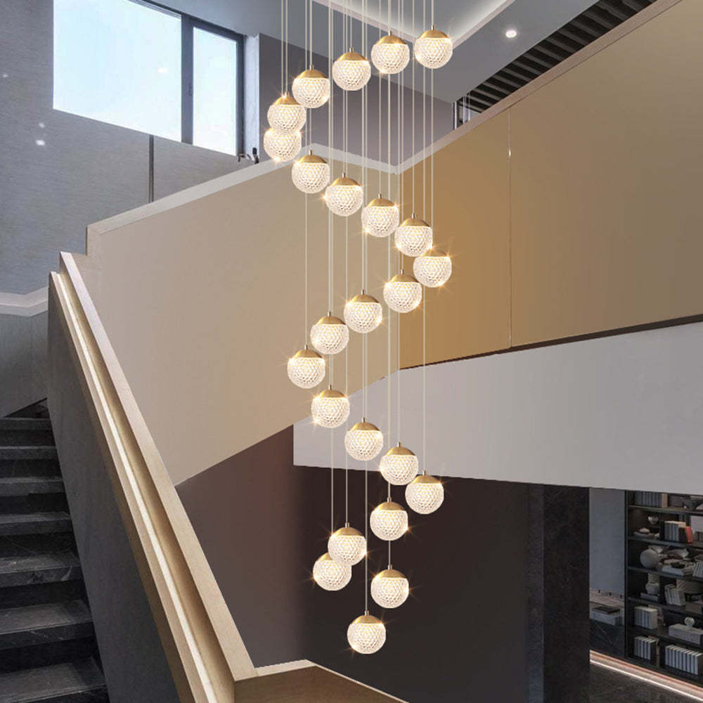 Jibril Multi Staircase Modern Art Deco Pendant Light illuminating a modern staircase