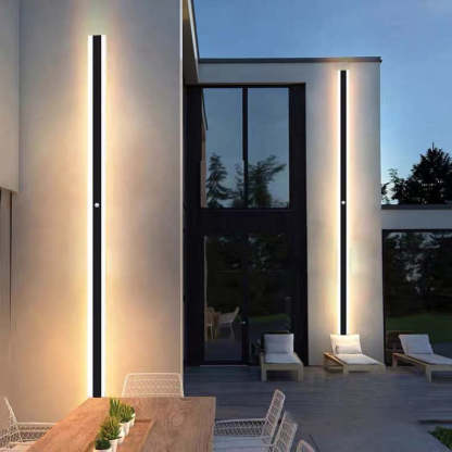 Orr minimalist outdoor wall lamps illuminate modern patio.