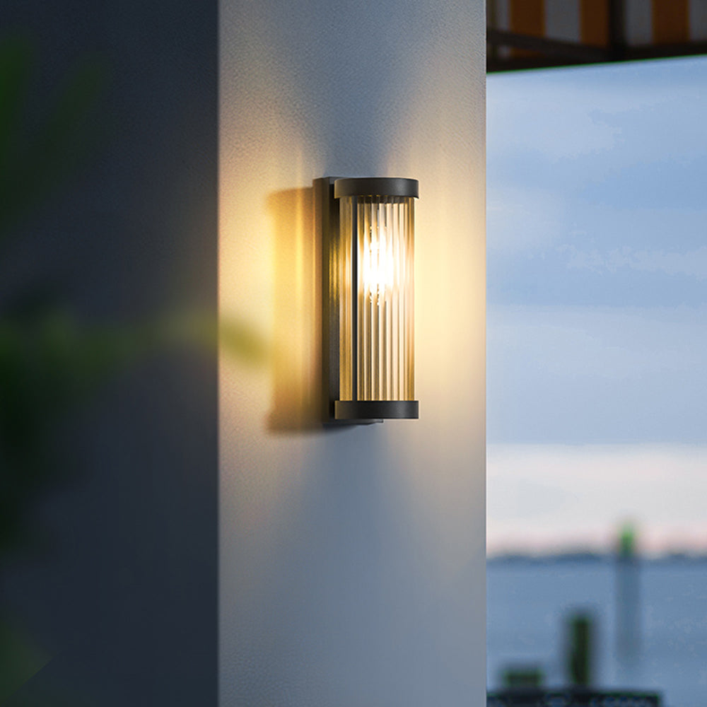 Orr Cylindrical Outdoor Wall Lamp illuminating wall
