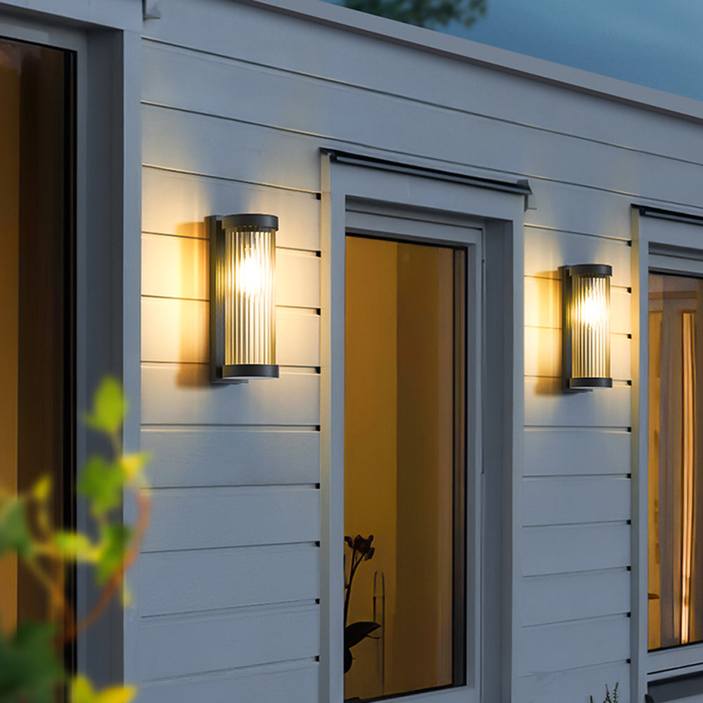 Orr outdoor wall lamp illuminating a white exterior wall