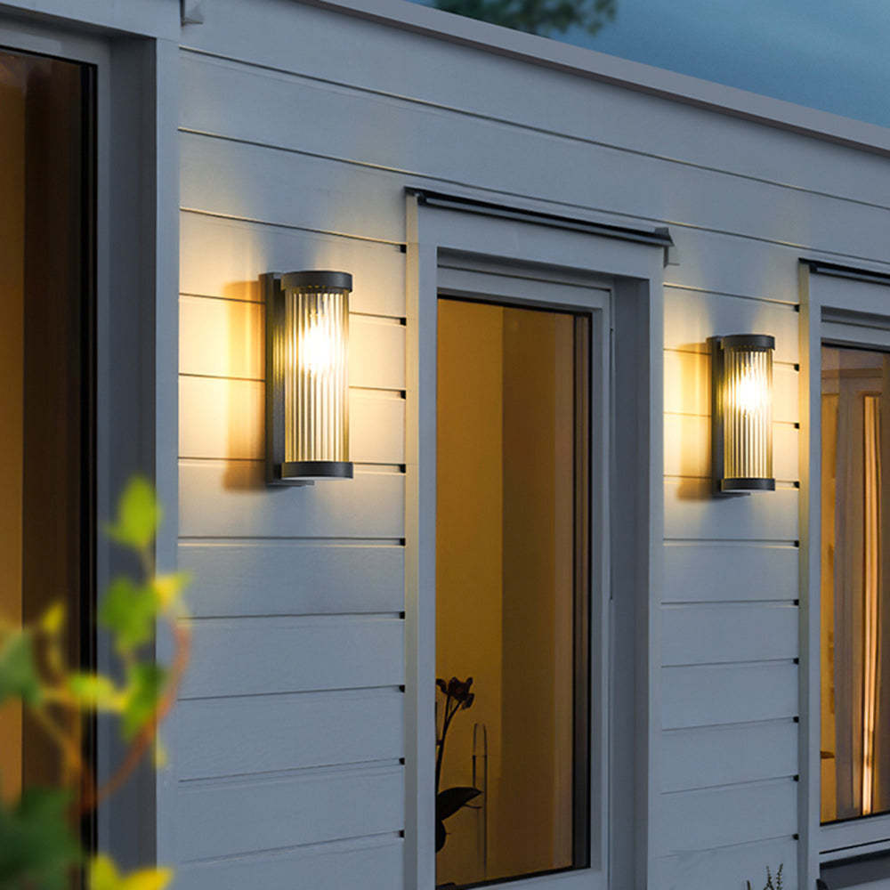 Orr outdoor wall lamp illuminating a white exterior wall