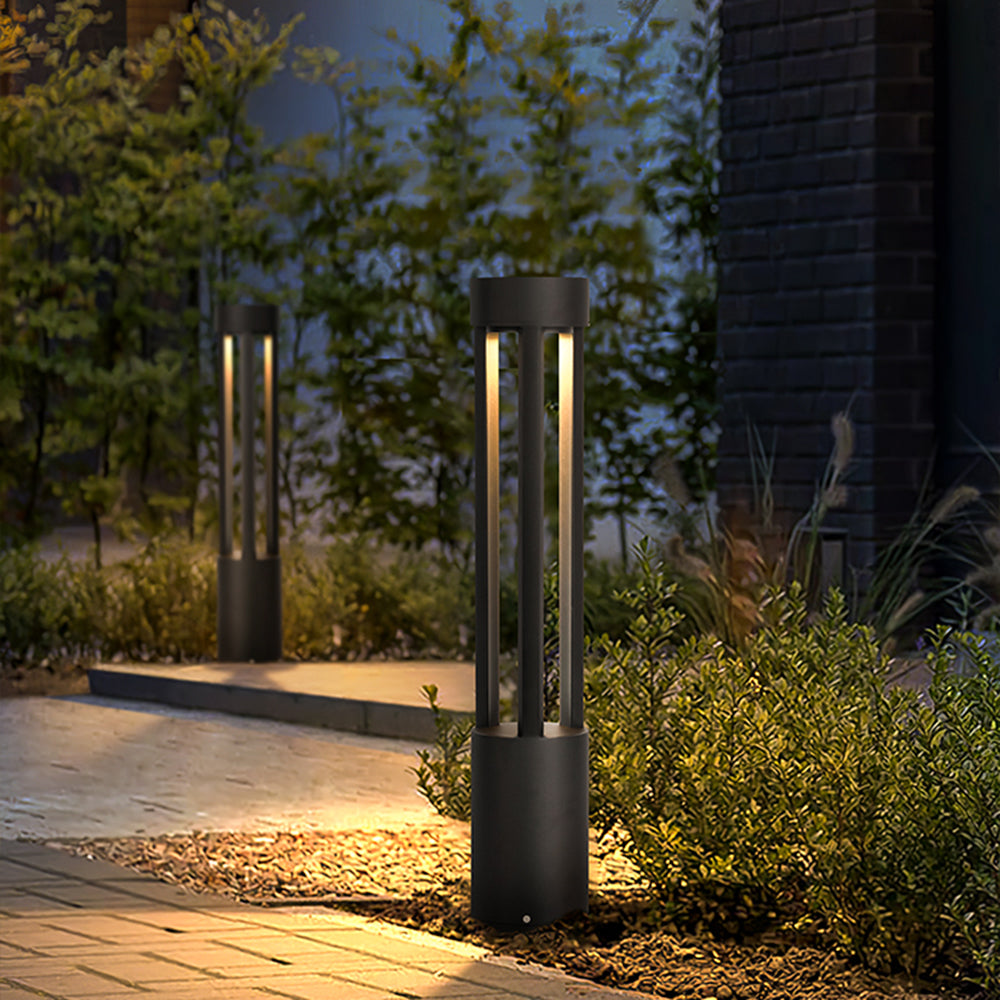 Pena Modern Path Light illuminating a garden at night